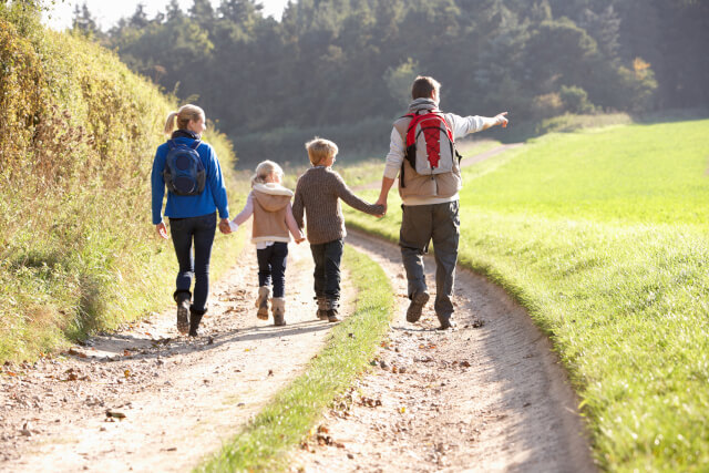 Young family on countryside walk