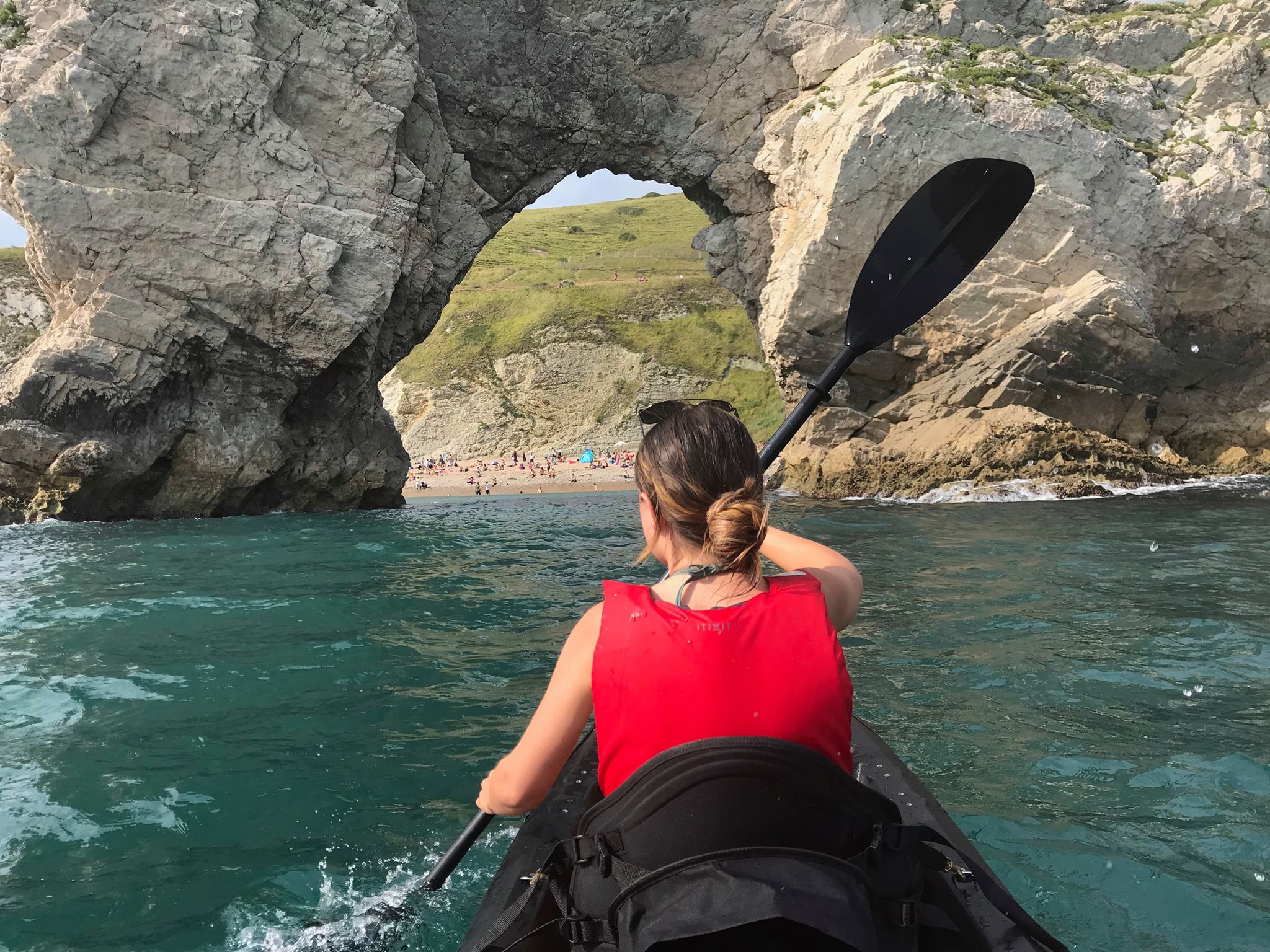 Kayaking through Durdle Door