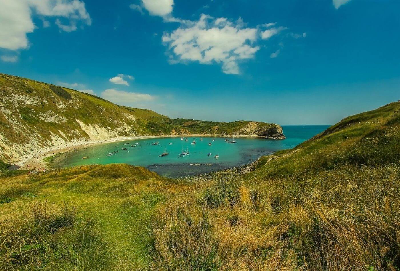 lolworth cove with blue skies and crystal clear waters