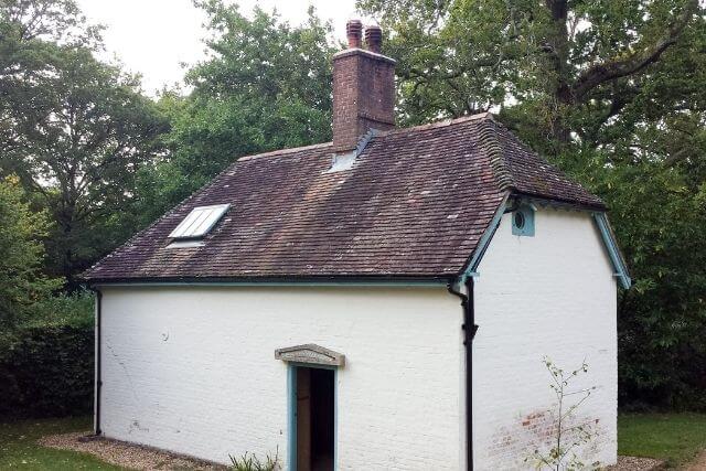 White exterior of Clouds Hill cottage in Dorset