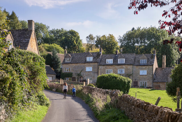 A family walking through charming village 